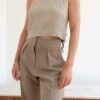 Pleated Trousers in Beige by Table - Image 4