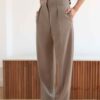 Pleated Trousers in Beige by Table - Image 2