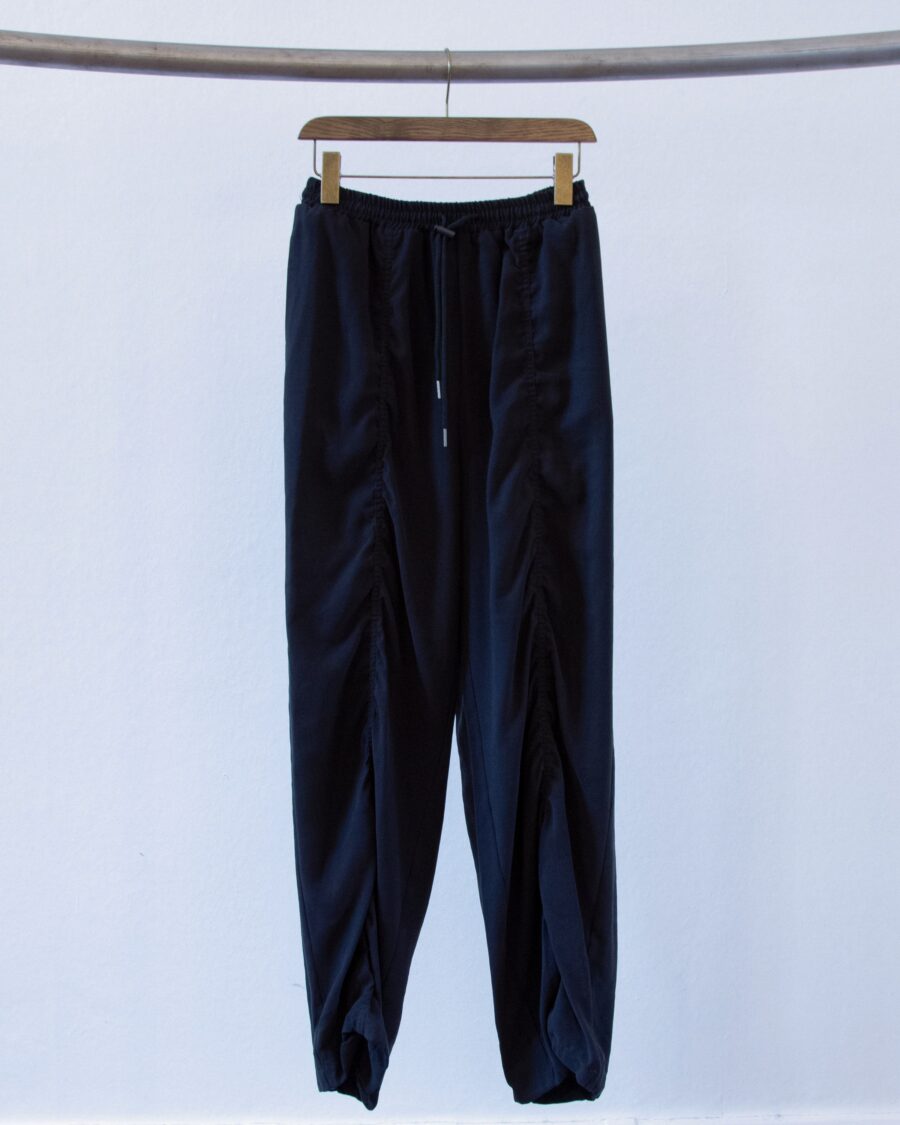 Windbreaker Pants in Black by We Are